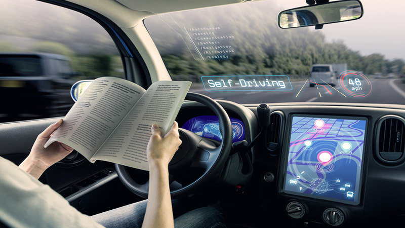 Self-driving vehicle, driver reading