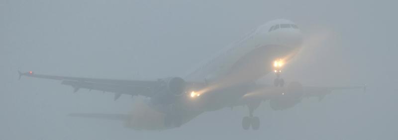 Airplane in the fog