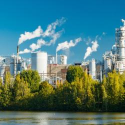 Modern pulp mill in Finland with chimneys and process buildings